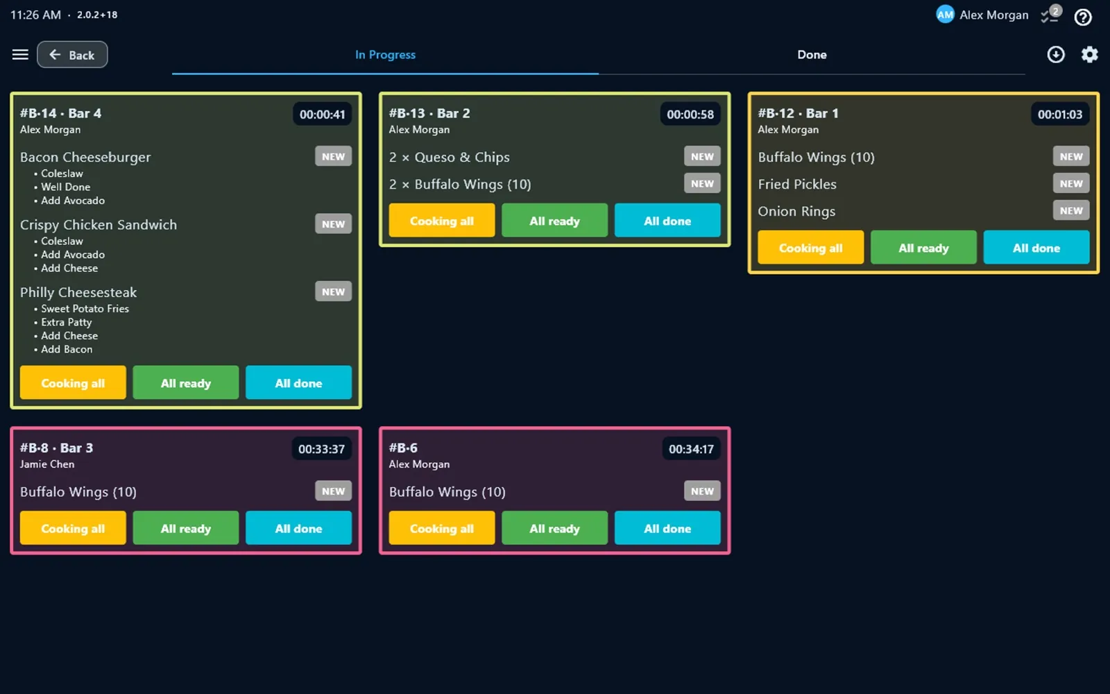 PalomaPOS kitchen display showing tickets by table with modifiers and timers